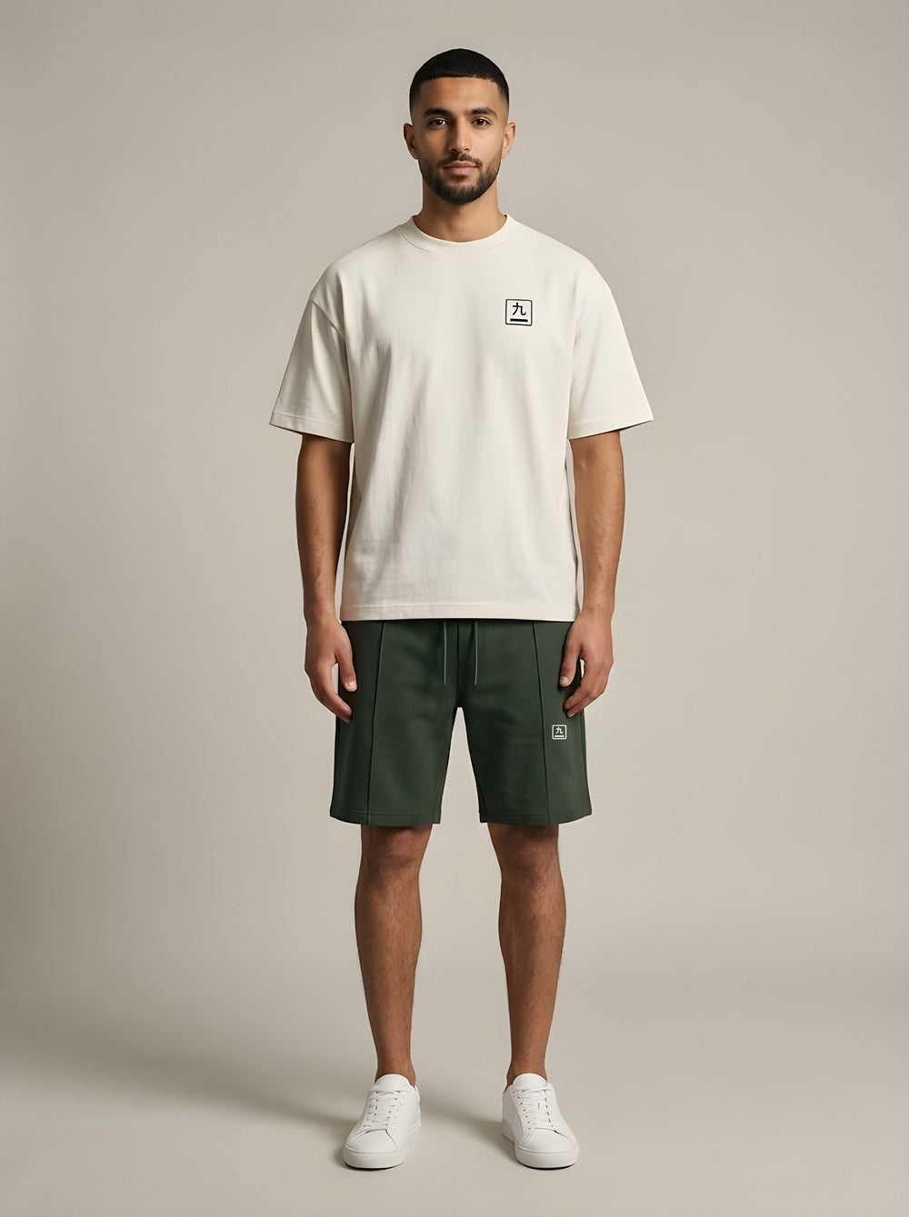 Model wearing the NINE1 Kanji Shorts (N1S03) with the Kanji Tee (N1T03)