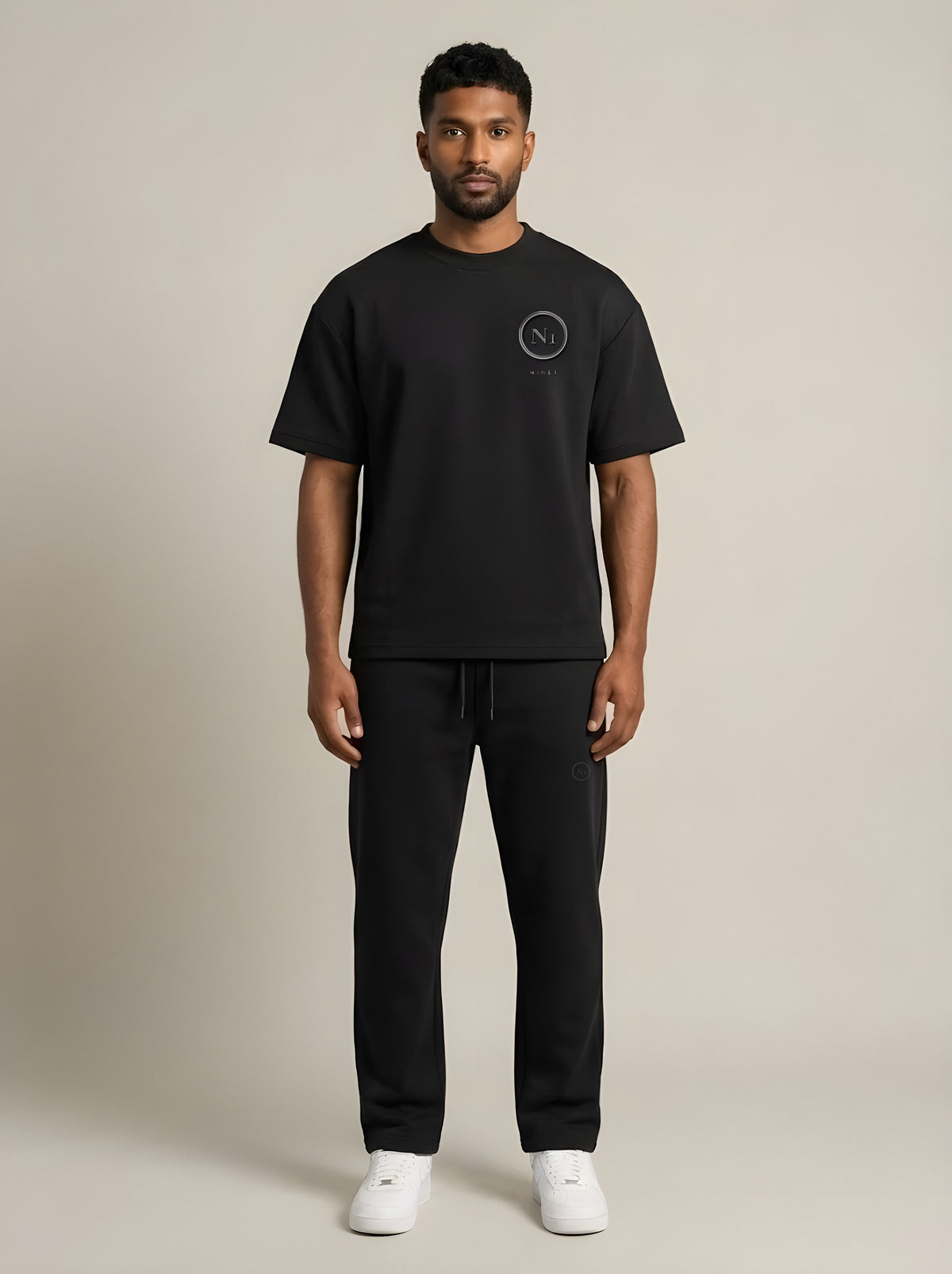 Model wearing the NINE1 Monogram Tee (N1T05) with the Monogram Jogger (N1J05)