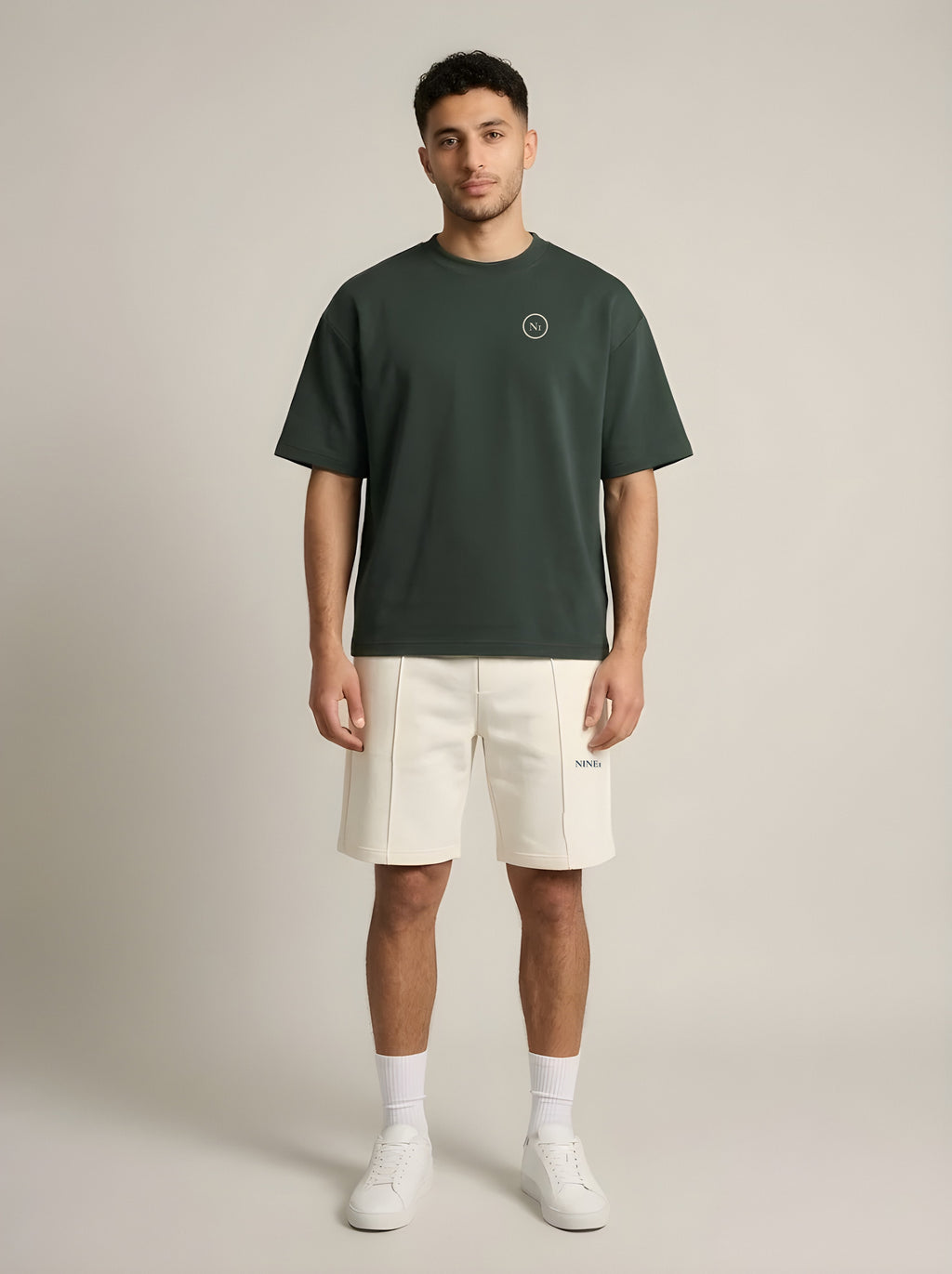Model wearing the NINE1 Spine Tee (N1T07) with the Spine Shorts (N1S07)