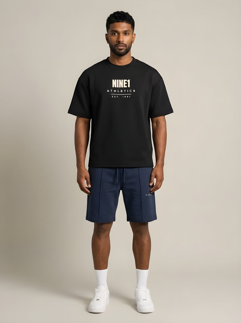 Model wearing the NINE1 Athletics Tee (N1T11) with the Athletics Shorts (N1S11)