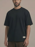Label Oversized Tee in Black, N1T17, cream woven NINE1 flag label at the side seam