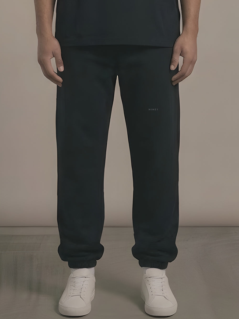 Dial Open-Hem Jogger in Black, N1J19, tonal NINE1 micro wordmark at the leg
