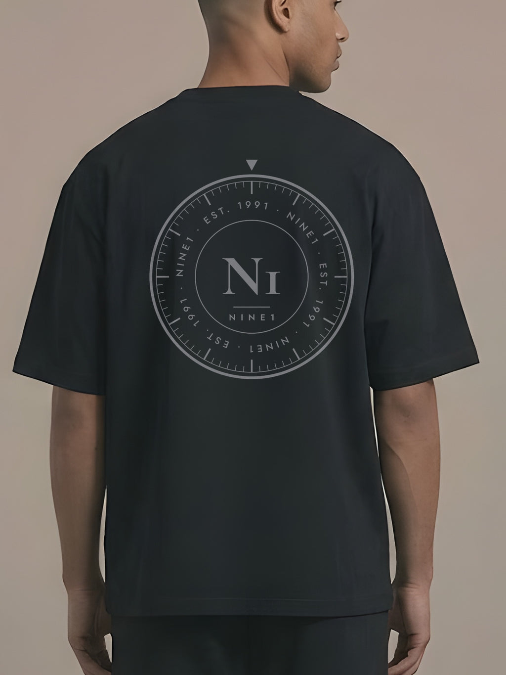 Dial Oversized Tee in Black, N1T19, large tonal NINE1 dial printed across the back