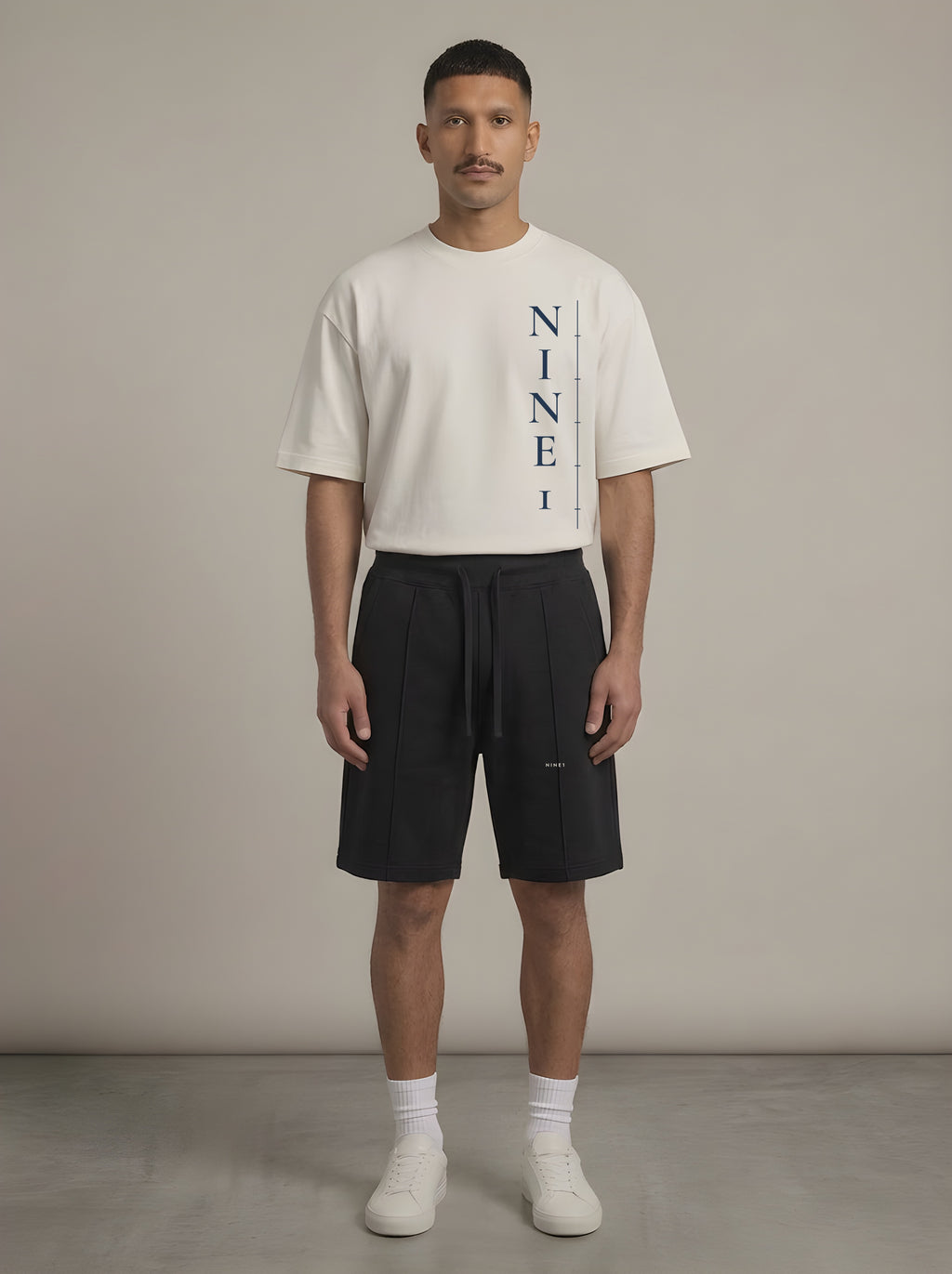 Column look: N1T22 tee in Off White with N1S22 shorts in Black