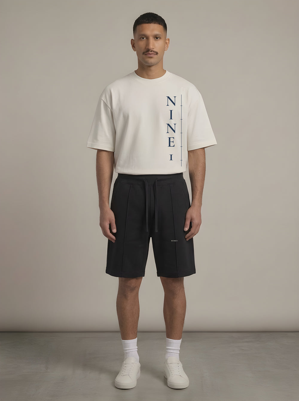 Column look: N1T22 tee in Off White with N1S22 shorts in Black