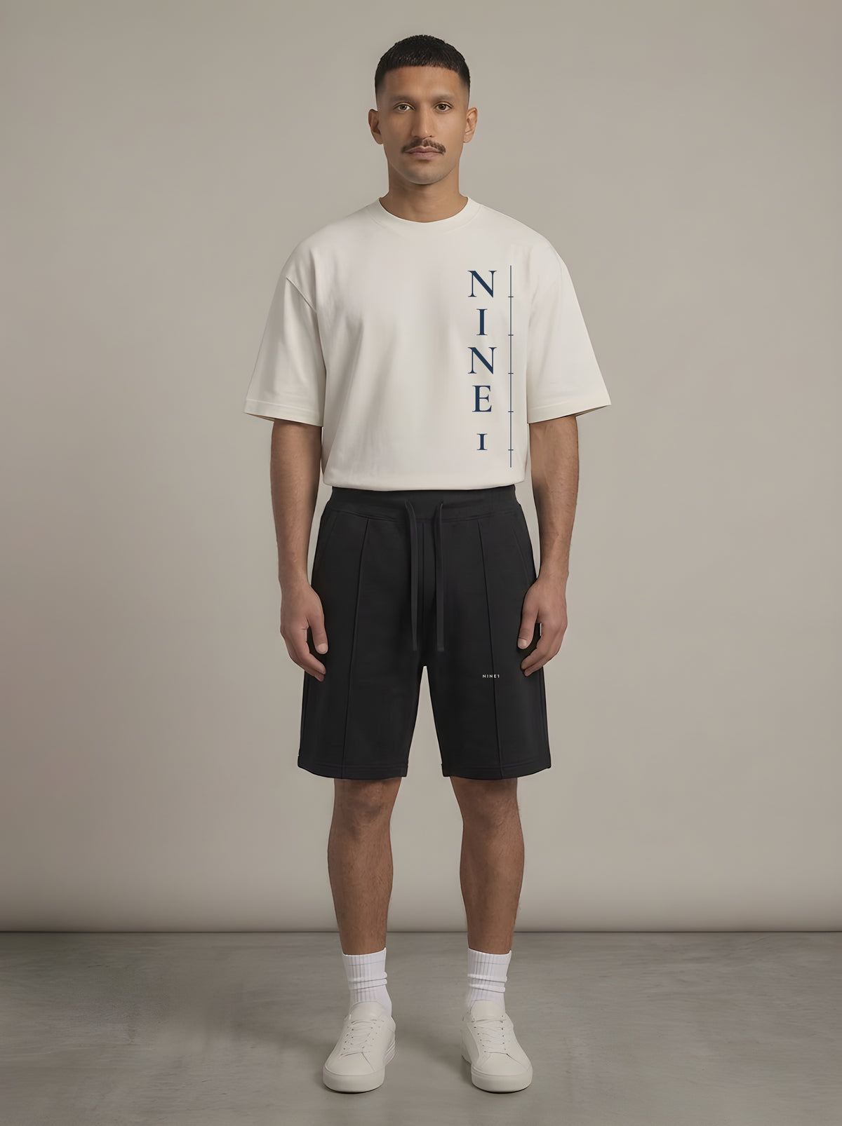 Column look: N1T22 tee in Off White with N1S22 shorts in Black
