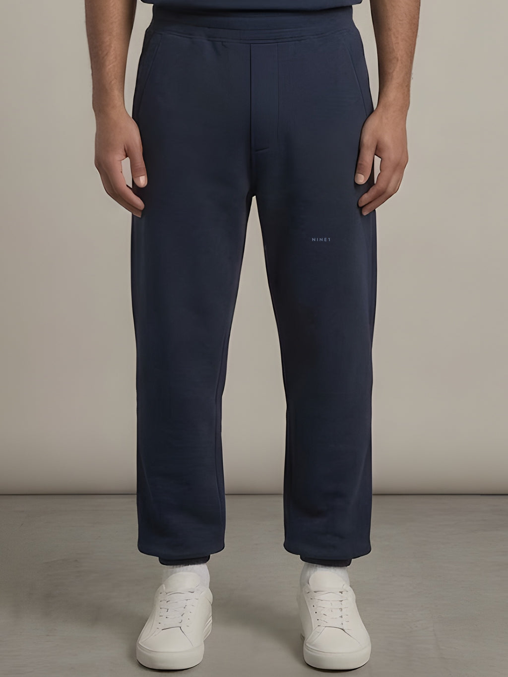 Grid Open-Hem Jogger in Navy, N1J23, tonal NINE1 micro wordmark at the leg