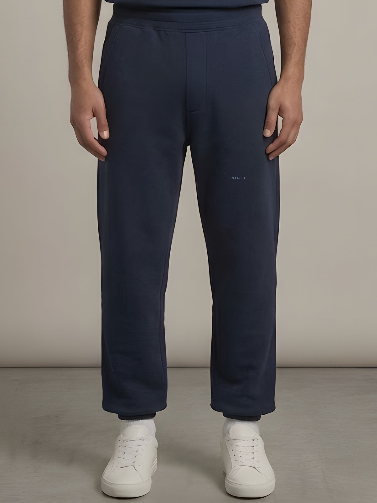 Grid Open-Hem Jogger in Navy, N1J23, tonal NINE1 micro wordmark at the leg