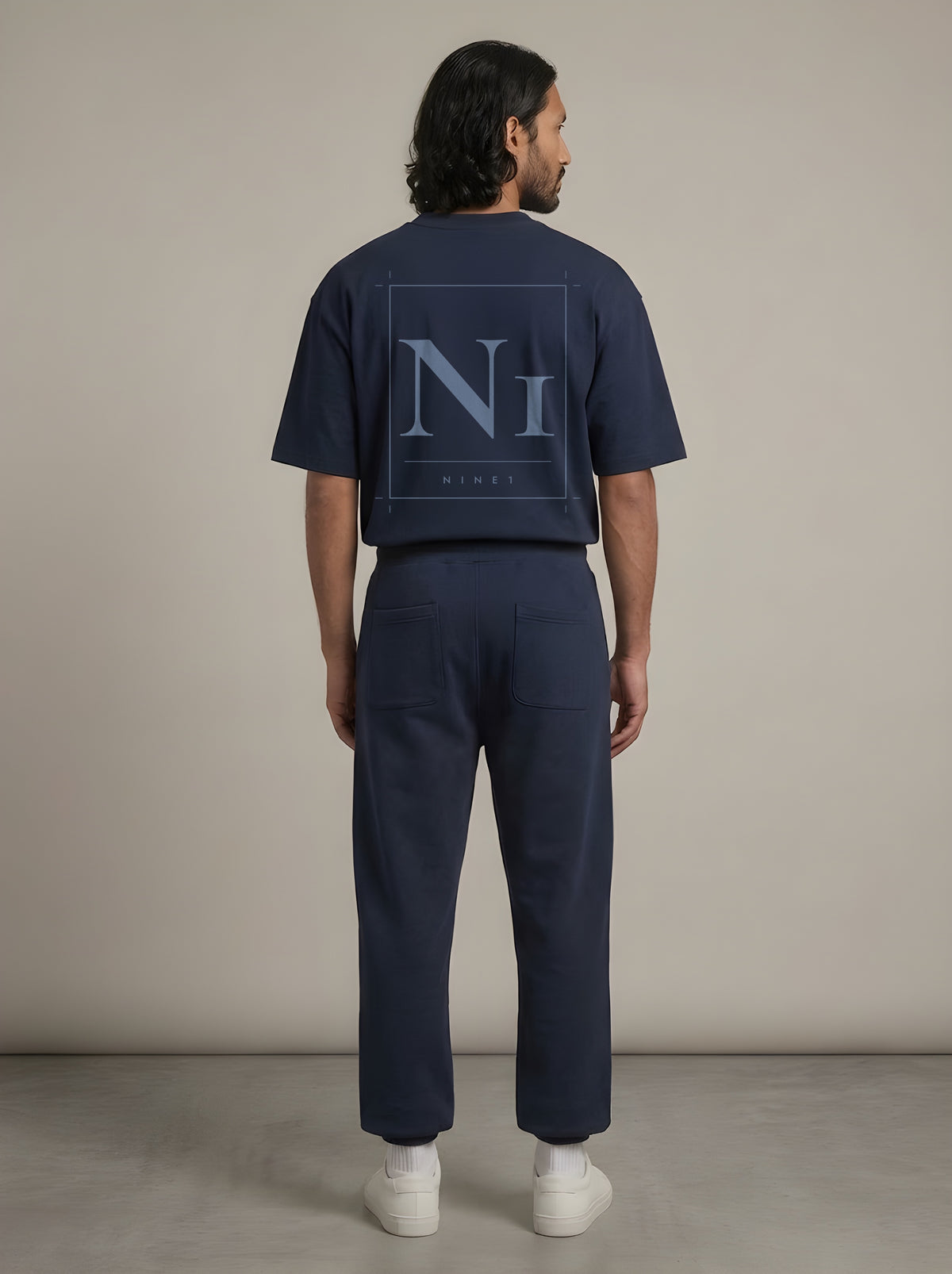 Grid look from the back: N1T23 tee with N1J23 jogger in Navy