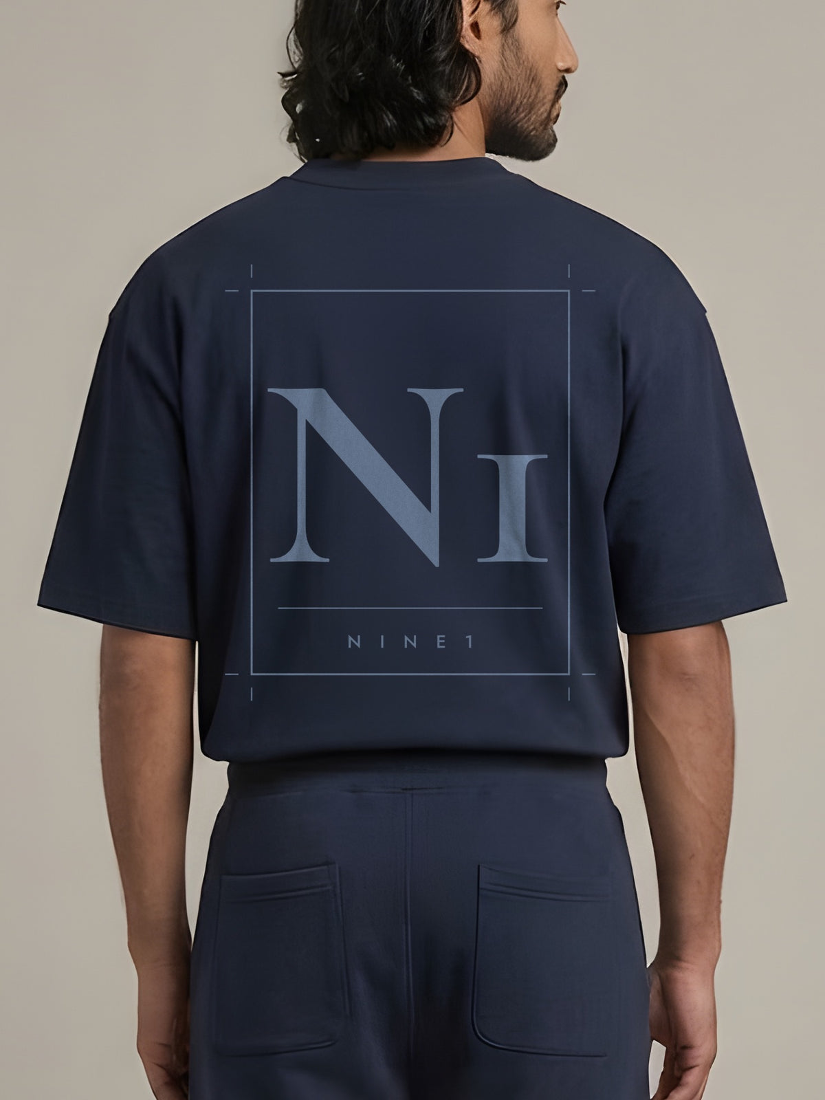 Grid Oversized Tee in Navy, N1T23, large tonal N1 frame printed across the back